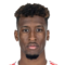 K. Coman