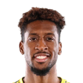 K. Coman
